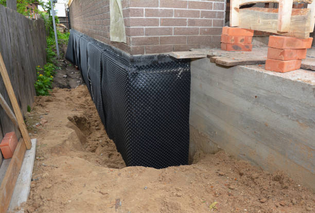 SJ Waterproofing Pros technician performing targeted Foundation Crack Repair assessment in Old Fort, OH